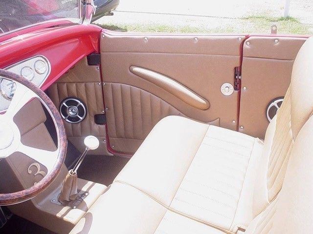 Cream interior and door cards in a classic coupe