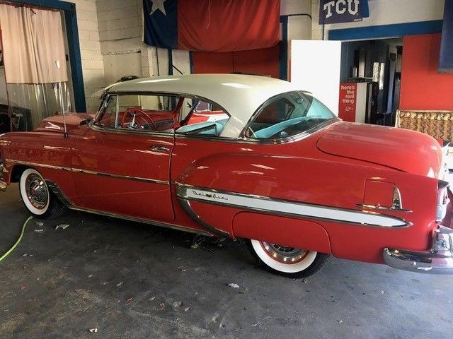 Hardtop with continental kit, outside the shop