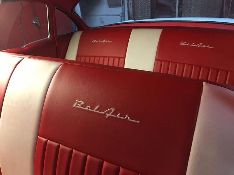 Seat backs in red and cream, with badging
