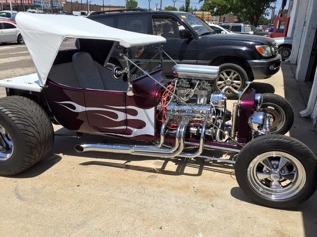 Purple hot rod with flame paint and custom upholstery